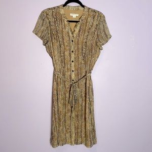 Brown and tan zebra print button down dress with tied waist and ruffle detail